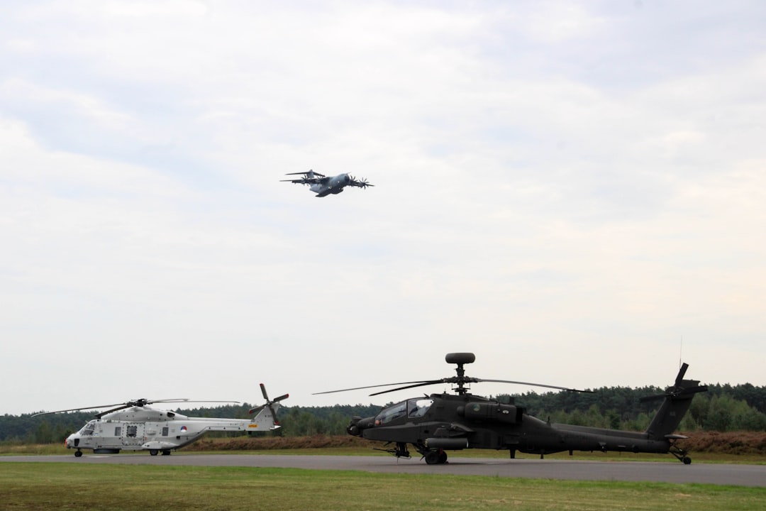 A helicopter and a helicopter on a runway
