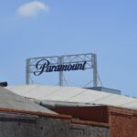 Paramount studios' sign stands against the blue sky.