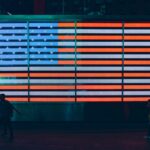 shallow focus photo of flag of United States of America neon light