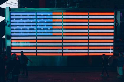 shallow focus photo of flag of United States of America neon light