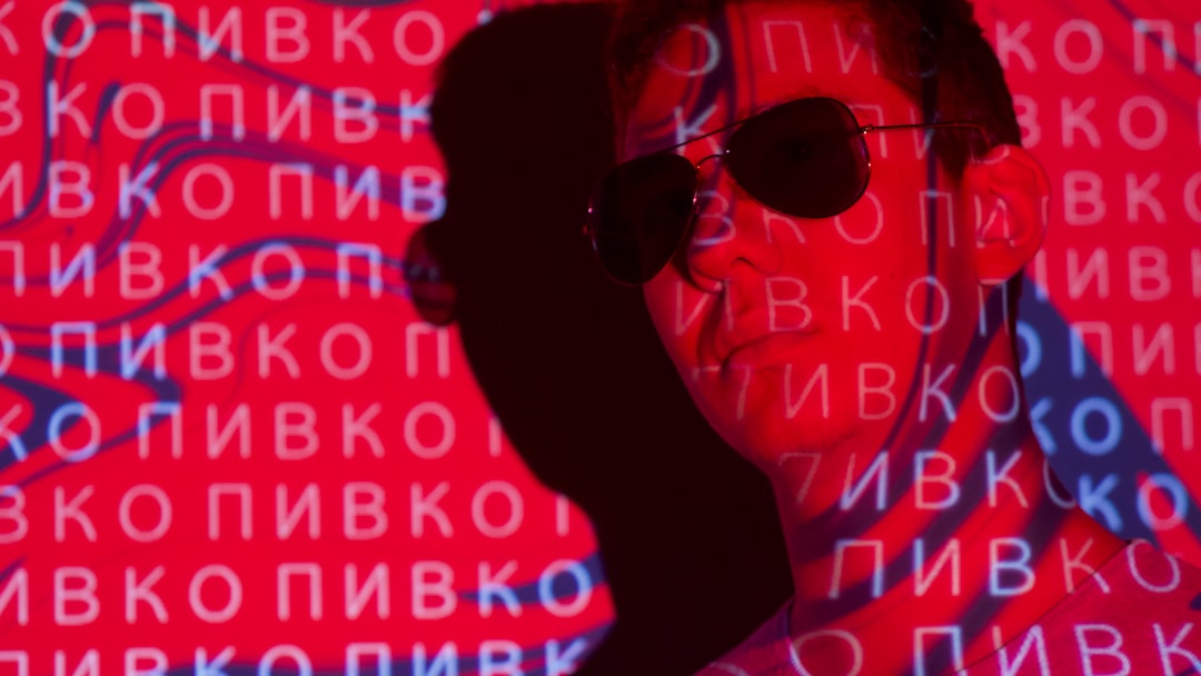 man in black sunglasses smiling