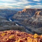 The Colorado River winding through the deep rocky canyons of the Grand Canyon