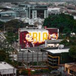 A large billboard on the side of a building