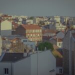 Rooftops and buildings in a city during the day