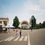 people walking in a plaza